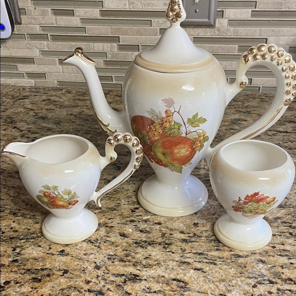 Elegant White and Gold Tea Set with Fruit Design